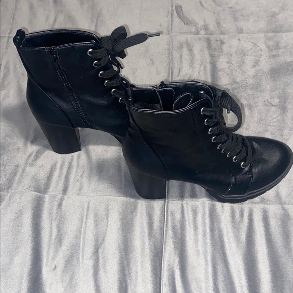 Black heeled combat boot
